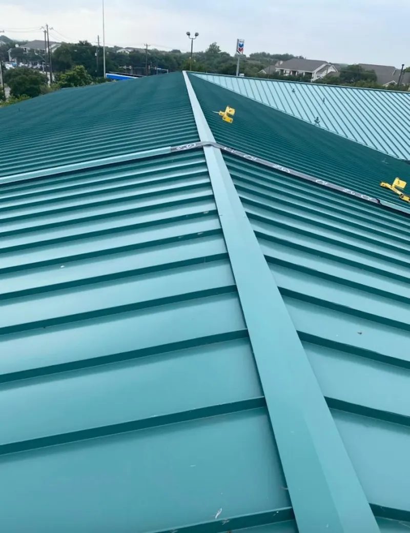 Green commercial metal roof ridge and valley for Metal Roof Repair in Jackson